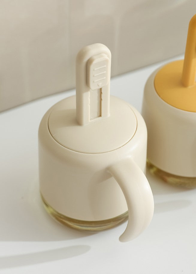 RECIPIENTE CON CUCHARA RETRACTIL