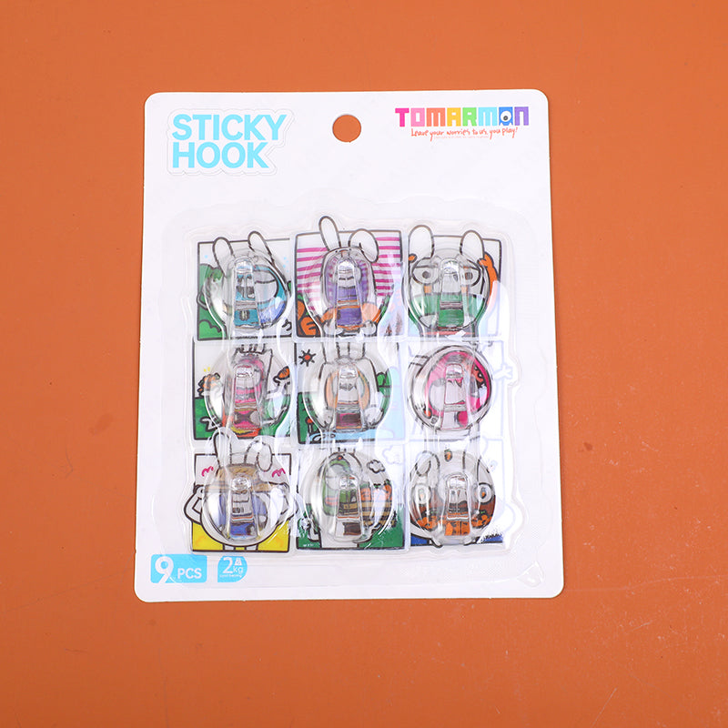 GANCHO ADHESIVO - 9 UND - CARICATURAS