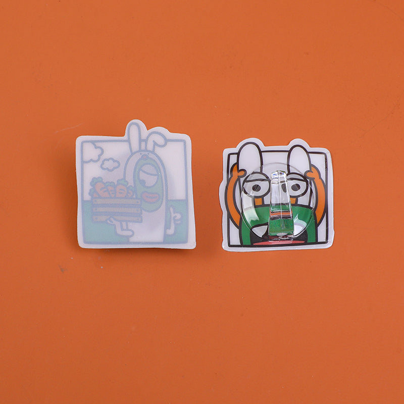 GANCHO ADHESIVO - 9 UND - CARICATURAS