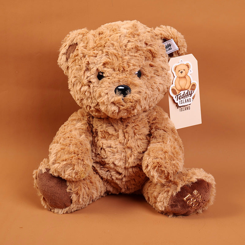 PELUCHE - TEDDY ISLAND - MARRON OSCURO SENTADO - 25CM