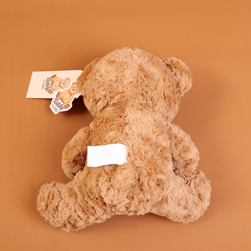 PELUCHE - TEDDY ISLAND - MARRON OSCURO SENTADO - 25CM