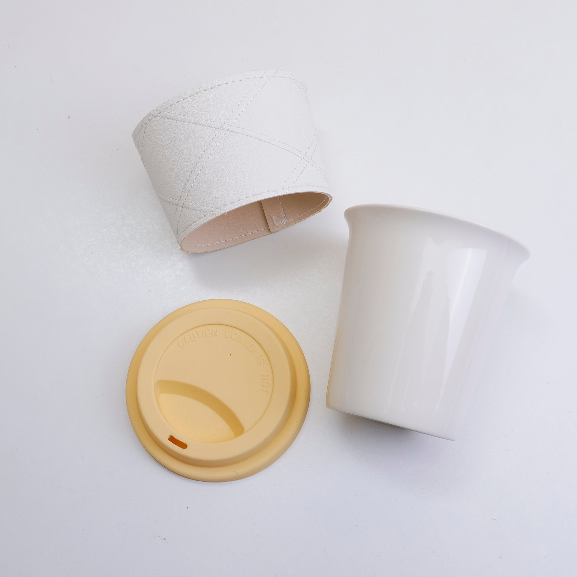 TAZA DE CAFÉ CON FORRO EN CUERO - BLANCO