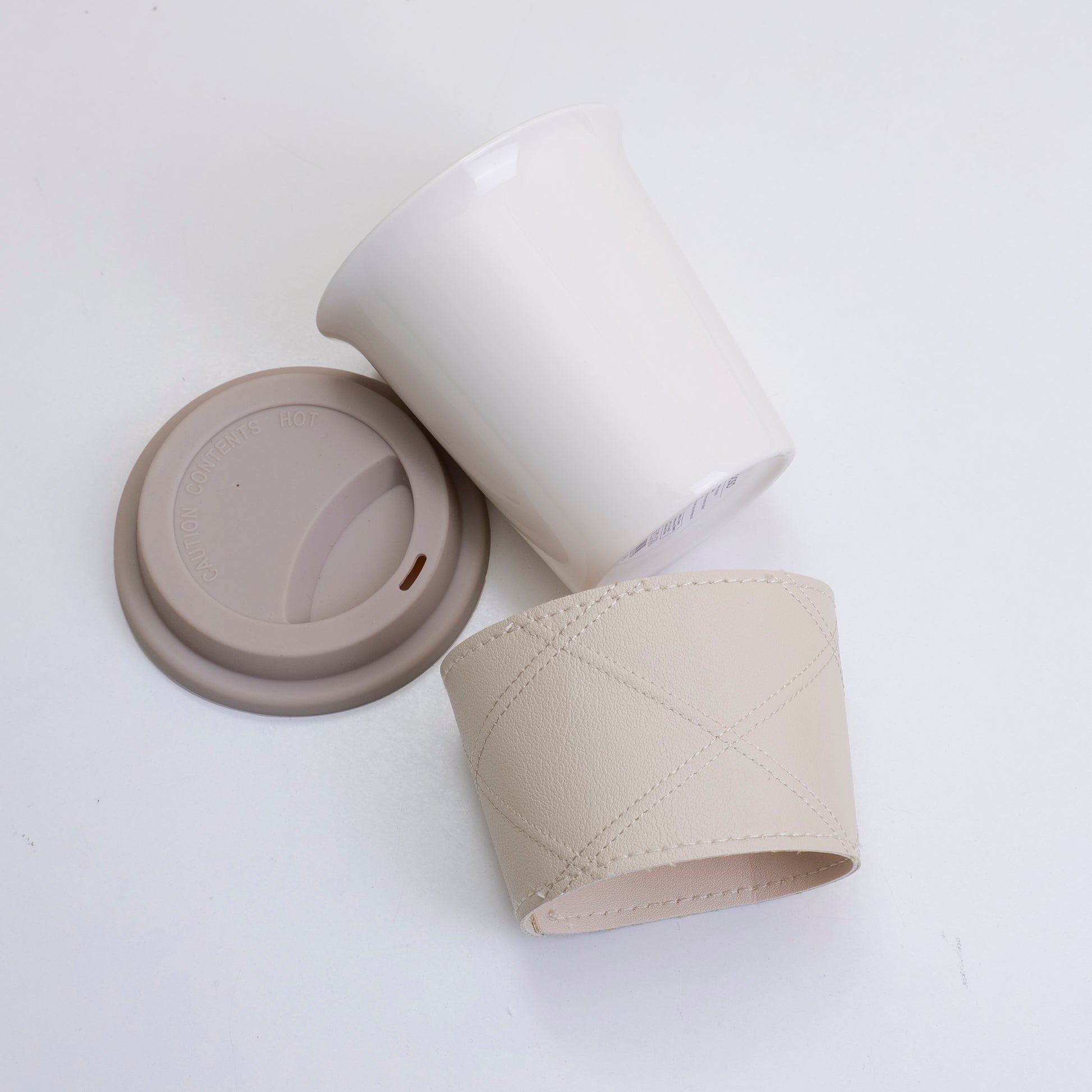 TAZA DE CAFÉ CON FORRO EN CUERO - GRIS